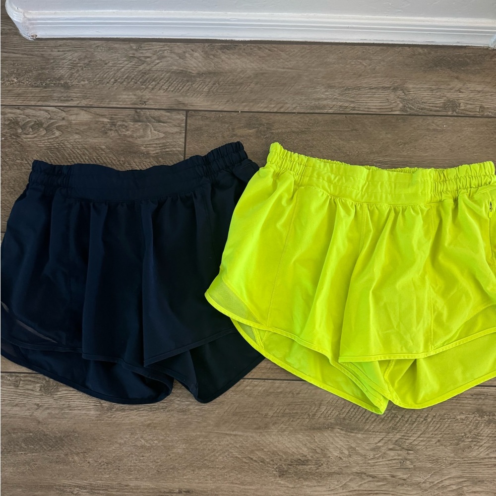 Pair of Lululemon Neon Yellow and Navy Women's workout shorts size 8